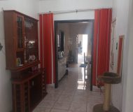 Casa com 250m², 3 dormitórios, 4 vagas no bairro Parque Minuano em Porto Alegre