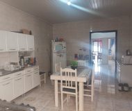 Casa com 250m², 3 dormitórios, 4 vagas no bairro Parque Minuano em Porto Alegre