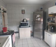 Casa com 250m², 3 dormitórios, 4 vagas no bairro Parque Minuano em Porto Alegre