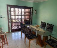 Casa com 202m², 3 dormitórios, 1 suíte, 2 vagas no bairro Rubem Berta em Porto Alegre