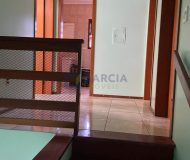 Casa com 202m², 3 dormitórios, 1 suíte, 2 vagas no bairro Rubem Berta em Porto Alegre