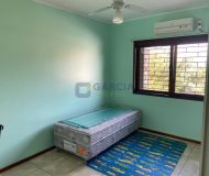 Casa com 202m², 3 dormitórios, 1 suíte, 2 vagas no bairro Rubem Berta em Porto Alegre