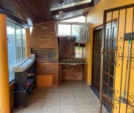 Casa com 202m², 3 dormitórios, 1 suíte, 2 vagas no bairro Rubem Berta em Porto Alegre