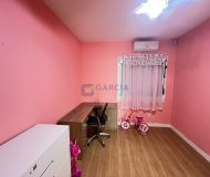Casa com 88m², 2 dormitórios, 2 vagas no bairro Sarandi em Porto Alegre