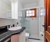 Casa com 302m², 4 dormitórios, 2 suítes, 4 vagas no bairro Jardim Lindóia em Porto Alegre