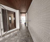 Casa com 237m², 4 dormitórios, 3 vagas no bairro Santa Maria Goretti em Porto Alegre