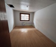 Casa com 237m², 4 dormitórios, 3 vagas no bairro Santa Maria Goretti em Porto Alegre