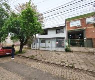 Casa com 237m², 4 dormitórios, 3 vagas no bairro Santa Maria Goretti em Porto Alegre