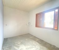 Casa com 300m², 4 dormitórios, 1 suíte, 2 vagas no bairro Sarandi em Porto Alegre