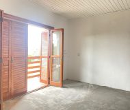 Casa com 300m², 4 dormitórios, 1 suíte, 2 vagas no bairro Sarandi em Porto Alegre