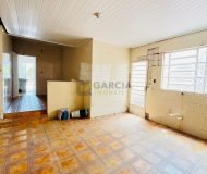 Casa com 290m², 2 dormitórios, 3 vagas no bairro Sarandi em Porto Alegre