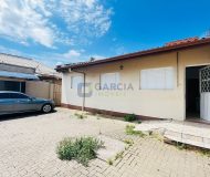 Casa com 290m², 2 dormitórios, 3 vagas no bairro Sarandi em Porto Alegre