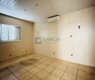 Casa com 290m², 2 dormitórios, 3 vagas no bairro Sarandi em Porto Alegre