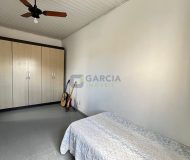 Casa com 154m², 3 dormitórios, 2 vagas no bairro Jardim Itu em Porto Alegre