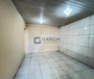 Casa com 60m², 2 dormitórios, 3 vagas no bairro Sarandi em Porto Alegre