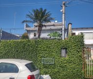 Casa com 400m², 3 dormitórios, 1 suíte, 2 vagas no bairro Costa e Silva em Porto Alegre