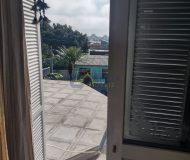 Casa com 400m², 3 dormitórios, 1 suíte, 2 vagas no bairro Costa e Silva em Porto Alegre
