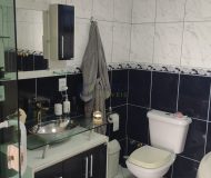 Casa com 400m², 3 dormitórios, 1 suíte, 2 vagas no bairro Costa e Silva em Porto Alegre