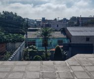 Casa com 400m², 3 dormitórios, 1 suíte, 2 vagas no bairro Costa e Silva em Porto Alegre
