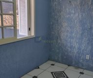Casa com 400m², 3 dormitórios, 1 suíte, 2 vagas no bairro Costa e Silva em Porto Alegre