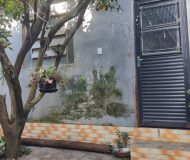 Casa com 400m², 3 dormitórios, 1 suíte, 2 vagas no bairro Costa e Silva em Porto Alegre