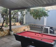 Casa com 400m², 3 dormitórios, 1 suíte, 2 vagas no bairro Costa e Silva em Porto Alegre