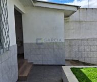 Casa com 228m², 3 dormitórios, 1 suíte, 4 vagas no bairro Vila Ipiranga em Porto Alegre