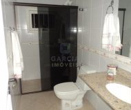 Casa com 286m², 4 dormitórios, 2 suítes, 2 vagas no bairro Santa Fé em Porto Alegre