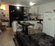 Casa com 286m², 4 dormitórios, 2 suítes, 2 vagas no bairro Santa Fé em Porto Alegre