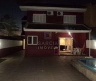 Casa com 286m², 4 dormitórios, 2 suítes, 2 vagas no bairro Santa Fé em Porto Alegre