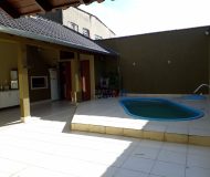 Casa com 212m², 3 dormitórios, 1 suíte, 3 vagas no bairro Rubem Berta em Porto Alegre