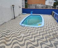 Casa com 360m², 7 dormitórios, 1 suíte, 2 vagas no bairro Jardim Itu em Porto Alegre