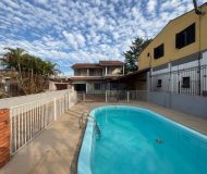 Casa com 250m², 3 dormitórios, 1 suíte, 3 vagas no bairro Santa Rosa de Lima em Porto Alegre