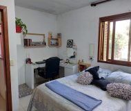 Casa com 122m², 5 dormitórios, 2 suítes, 2 vagas no bairro Jardim Floresta em Porto Alegre