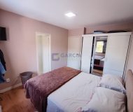 Casa com 242m², 2 dormitórios, 2 suítes, 4 vagas no bairro Ecoville em Porto Alegre