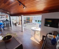 Casa com 242m², 2 dormitórios, 2 suítes, 4 vagas no bairro Ecoville em Porto Alegre