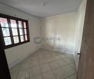 Casa com 167m², 2 dormitórios, 1 suíte, 2 vagas no bairro Sarandi em Porto Alegre