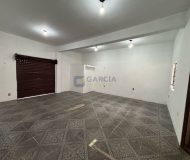 Casa com 310m², 6 dormitórios, 1 suíte, 4 vagas no bairro Jardim Floresta em Porto Alegre