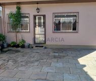 Casa com 201m², 4 dormitórios, 4 vagas no bairro Santa Rosa de Lima em Porto Alegre