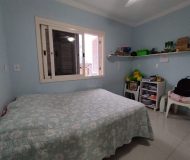 Casa com 170m², 4 dormitórios, 1 suíte, 2 vagas no bairro Sarandi em Porto Alegre