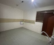 Casa com 396m², 4 dormitórios, 1 suíte, 4 vagas no bairro Jardim Lindóia em Porto Alegre