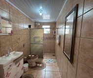 Casa com 181m², 2 dormitórios, 1 suíte, 7 vagas no bairro Sarandi em Porto Alegre