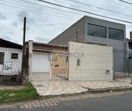 Casa com 181m², 2 dormitórios, 1 suíte, 7 vagas no bairro Sarandi em Porto Alegre
