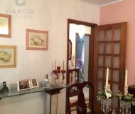 Casa com 230m², 3 dormitórios, 1 suíte, 2 vagas no bairro Jardim Lindóia em Porto Alegre