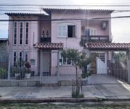 Casa com 250m², 3 dormitórios, 1 suíte, 2 vagas no bairro Sarandi em Porto Alegre