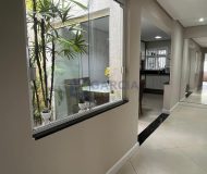 Casa com 108m², 3 dormitórios, 1 suíte, 3 vagas no bairro Parque Minuano em Porto Alegre