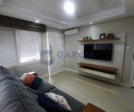 Casa com 108m², 3 dormitórios, 1 suíte, 3 vagas no bairro Parque Minuano em Porto Alegre