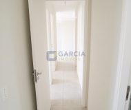 Apartamento com 62m², 3 dormitórios, 1 suíte, 1 vaga no bairro Passo das Pedras em Porto Alegre
