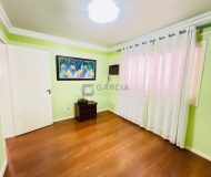 Casa com 202m², 3 dormitórios, 1 suíte, 5 vagas no bairro Jardim Itu em Porto Alegre