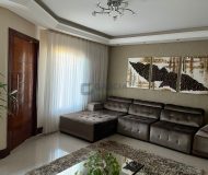 Casa com 212m², 3 dormitórios, 1 suíte, 3 vagas no bairro Rubem Berta em Porto Alegre